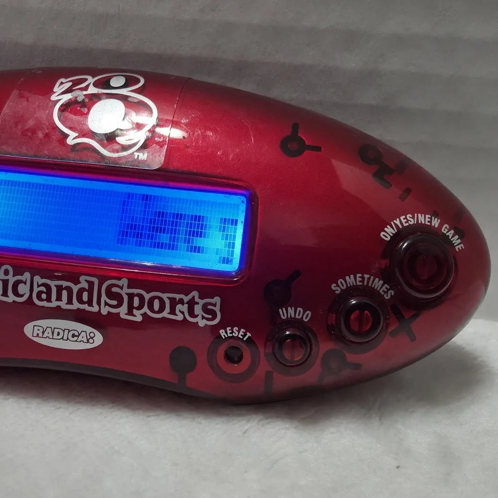 2006 Radica 20Q Music And‎ Sports Handheld Electronic Game Works